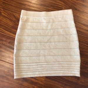 Fitted gold mini skirt